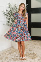 Petal to the Metal Flutter Sleeve Dress in Navy/Coral - Charming Charlie