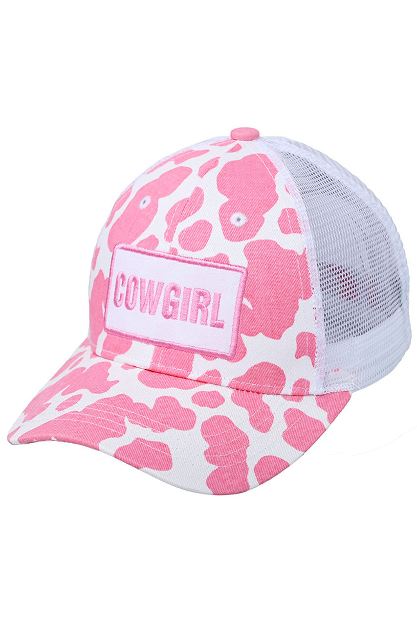 Pink C.C Cowgirl baseball cap features a cow pattern, perfect for any cowgirl looking to add some Western flair to their wardrobe. Made with high-quality materials, this cap is both stylish and durable. Complete your look with this must-have accessory.