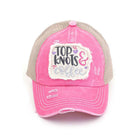 Pink C.C DISTRESSED TOP KNOTS AND COFFEE PATCH PONYCAP is an essential accessory for coffee lovers. Made with distressed fabric and a stylish top knot, it also features an embroidered coffee patch. Stay fashionable while showing off your love for coffee.