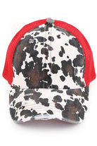 red C.C cow print criss cross ponycap is the perfect blend of style and functionality. The adjustable criss cross design allows for a comfortable and secure fit, while the unique cow print pattern adds a touch of fun to any outfit. Made with high-quality materials, this ponycap is durable and long-lasting.