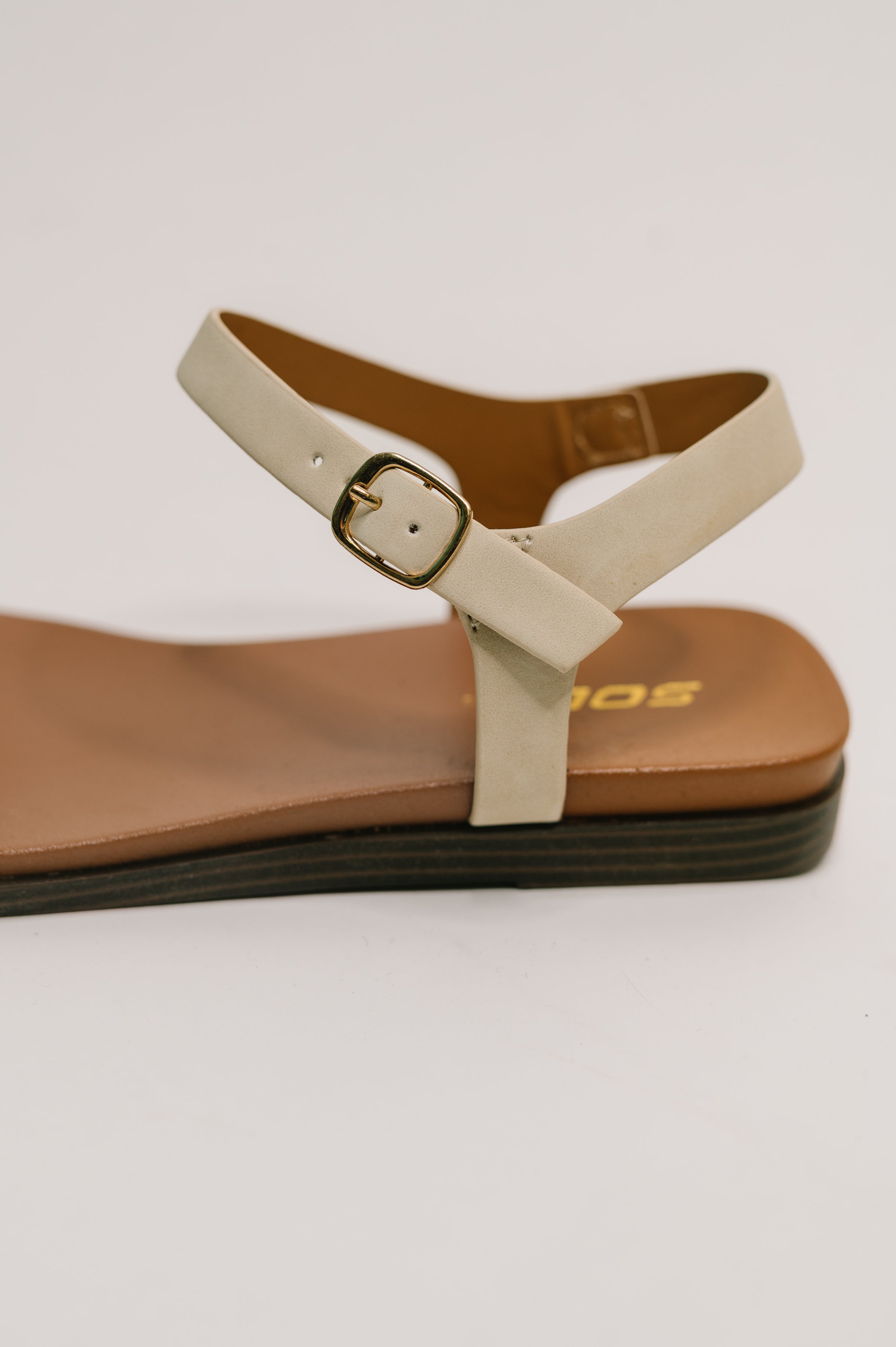 Riddle Ankle Strap Sandal in Beige - Charming Charlie