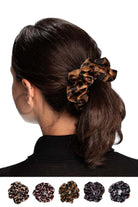 Rose C.C Leopard Velvet Scrunchies are the perfect addition to your hair accessory collection. Made with luxurious velvet material, these scrunchies provide a soft and comfortable hold for all hair types. With their trendy leopard print design, they add a touch of style to any outfit. Upgrade your hair game with these must-have scrunchies!