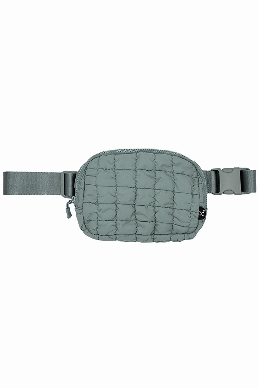 Sage C.C Quilted Puffer Fanny Pack is a stylish and functional accessory for any on-the-go individual. Made with durable quilted material, this fanny pack provides convenient storage for your essentials while remaining comfortable to wear. Perfect for travelers, runners, and outdoor enthusiasts.