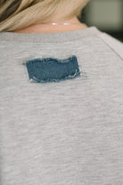 Star Stud Distressed Applique Top - Charming Charlie
