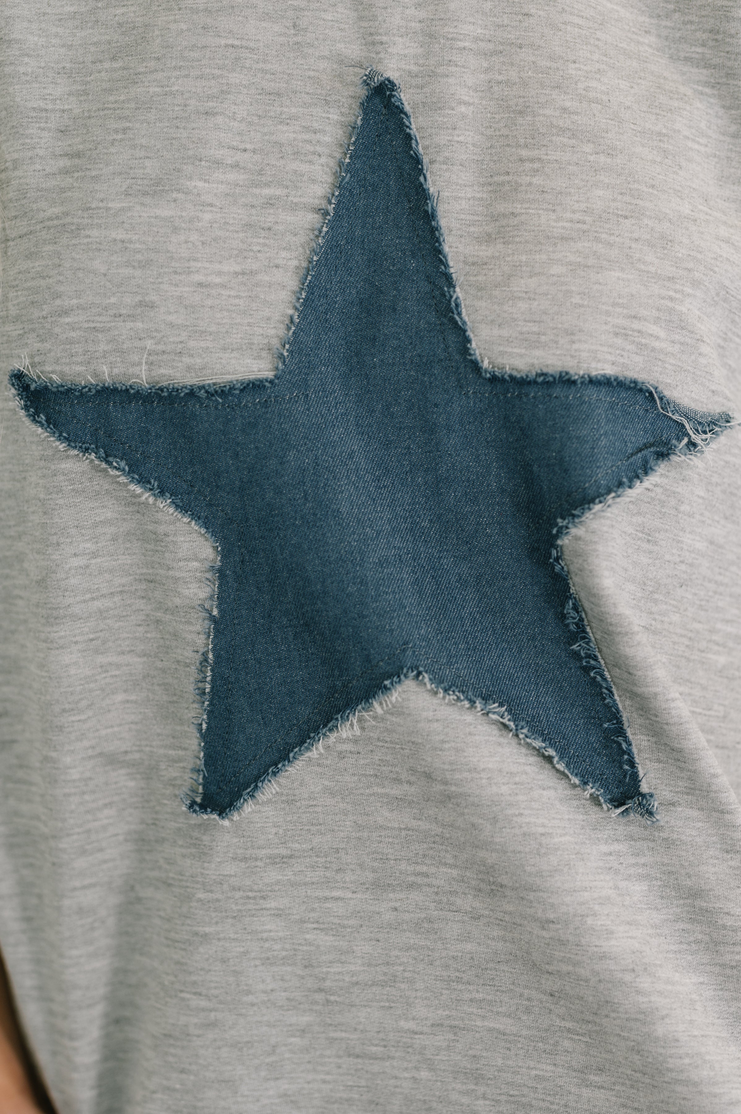 Star Stud Distressed Applique Top - Charming Charlie