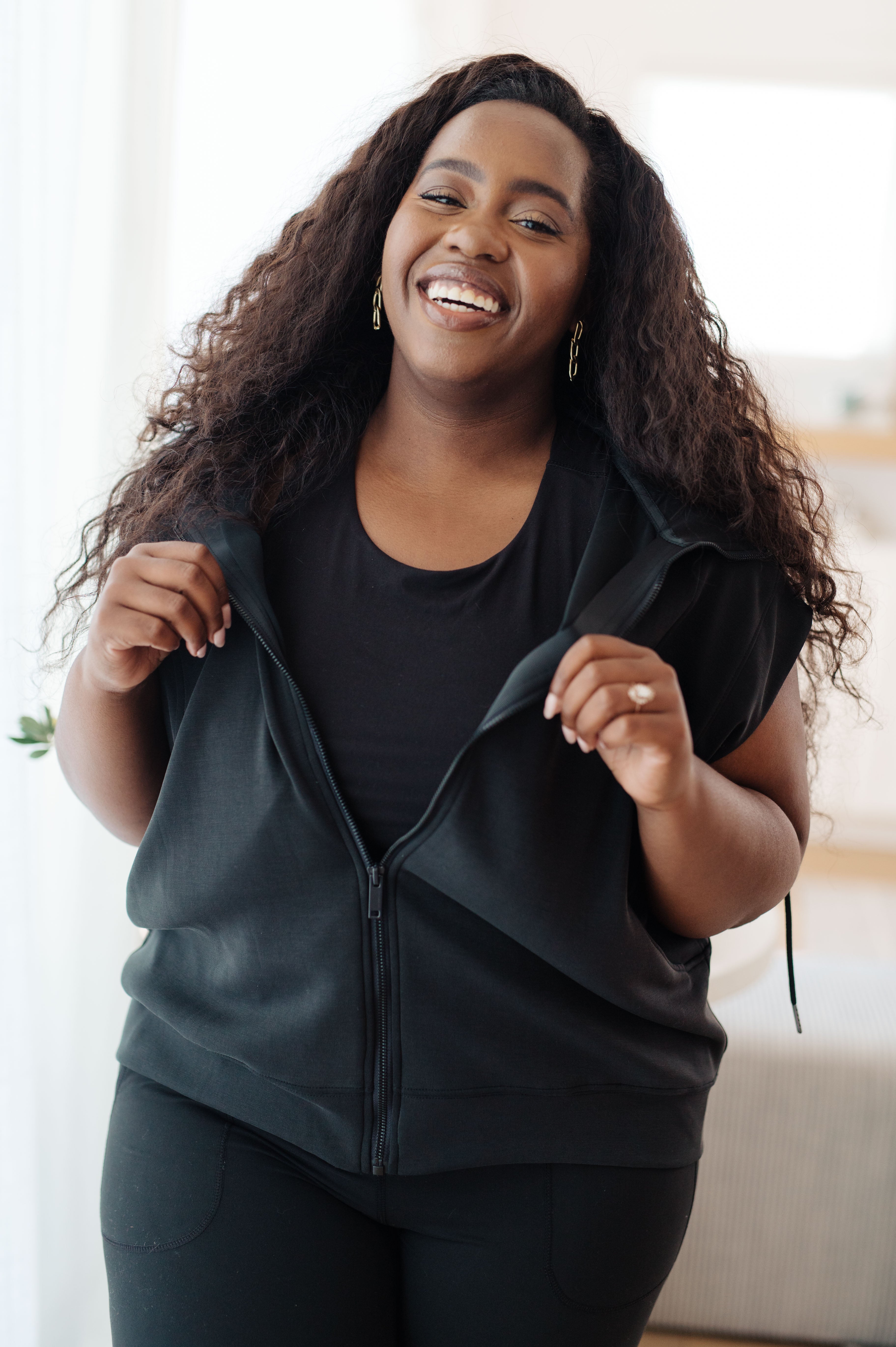 Still Moving Sleeveless Hoodie – Charming Charlie