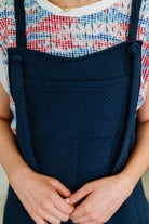 Suit Yourself Adjustable Strap Jumpsuit in Navy - Charming Charlie