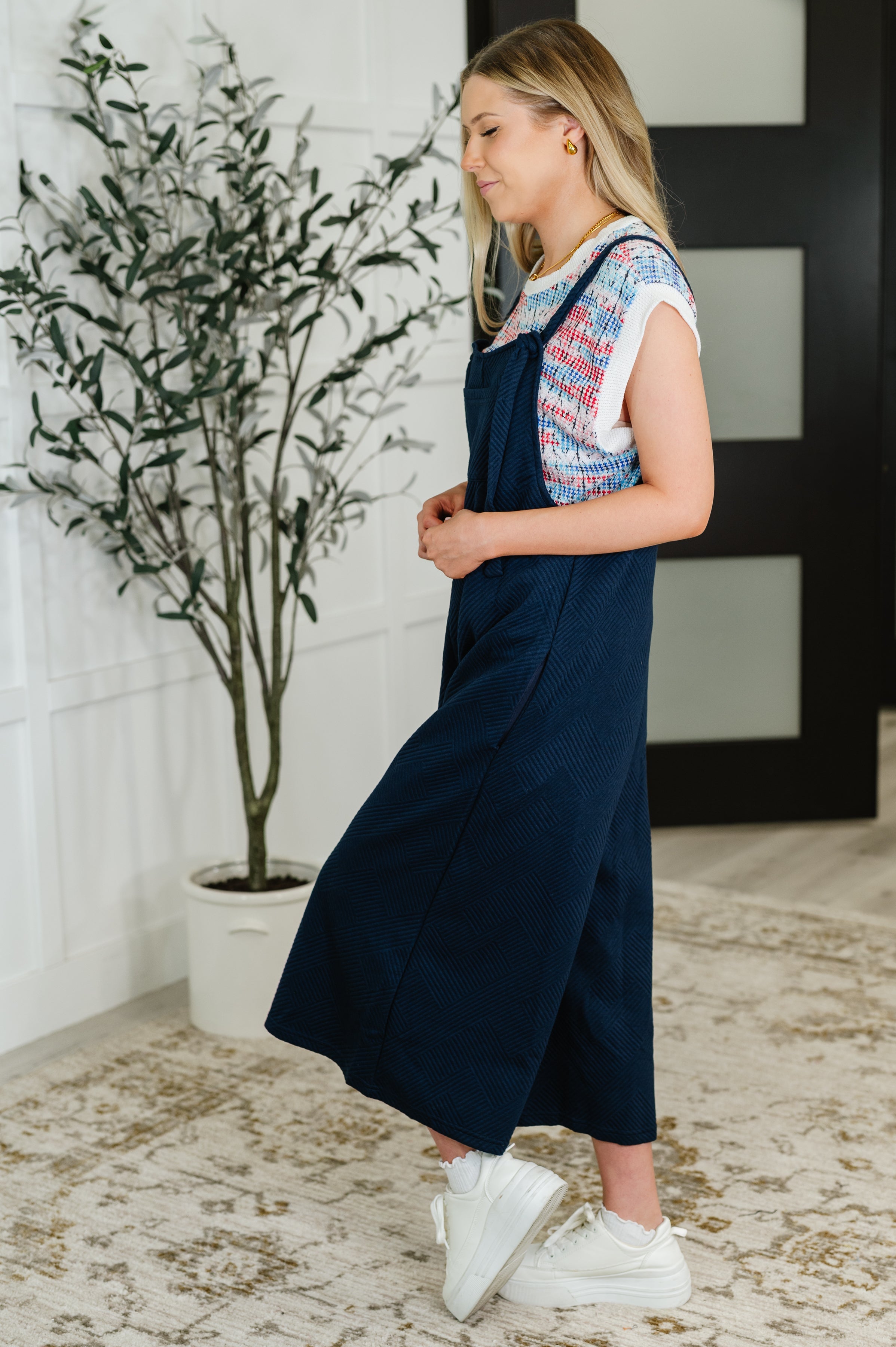 Suit Yourself Adjustable Strap Jumpsuit in Navy - Charming Charlie