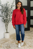 Sweet with a Side Eye Drop Shoulder Pullover in True Red - Charming Charlie