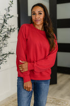 Sweet with a Side Eye Drop Shoulder Pullover in True Red - Charming Charlie
