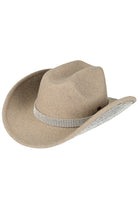 Taupe C.C Rhinestone Trim Vegan Cowboy Hat adds a touch of glam to any Western look. Made with vegan materials, it's cruelty-free and environmentally friendly. The rhinestone trim adds a subtle sparkle while the cowboy hat design keeps you shaded and stylish. Perfect for any fashion-forward and conscious cowgirl.