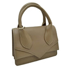 Taupe Faux Leather Top Handle Le Chiquito Tote Bag, is stylish, durable, and practical. The bag is made of faux leather with a sturdy top handle and an adjustable shoulder strap. The roomy design offers plenty of space. Experience effortless style and convenience with this chic, multi-functional tote.