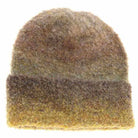 TaupeMix Multi-colored Slouchy Mohair Cuffed C.C Beanie combines the softness of mohair with a stylish, relaxed fit. Its vibrant multi-colored design adds a modern touch, while the cuffed edge ensures a secure and comfortable wear. Perfect for cooler weather, this beanie offers lightweight warmth without bulk, making it an ideal accessory for both casual outings and urban layering. Crafted for durability and style, it’s a versatile choice for those who appreciate quality knitwear.