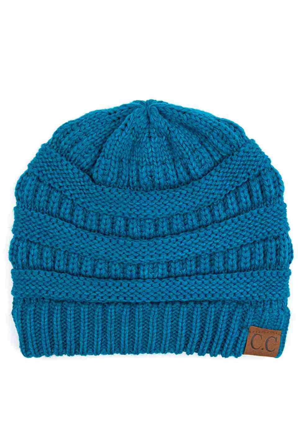 Teal C.C Ribbed Knit Solid Color Beanie offers a timeless design with durable ribbed knitting, ensuring a snug and comfortable fit. Crafted for warmth and versatility, this beanie is perfect for everyday wear, providing reliable protection against cold weather while maintaining a sleek, minimalist style that complements any outfit. Its solid color adds understated appeal, making it an essential accessory for both casual and outdoor use. 