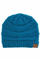 Teal C.C Ribbed Knit Solid Color Beanie offers a timeless design with durable ribbed knitting, ensuring a snug and comfortable fit. Crafted for warmth and versatility, this beanie is perfect for everyday wear, providing reliable protection against cold weather while maintaining a sleek, minimalist style that complements any outfit. Its solid color adds understated appeal, making it an essential accessory for both casual and outdoor use. 