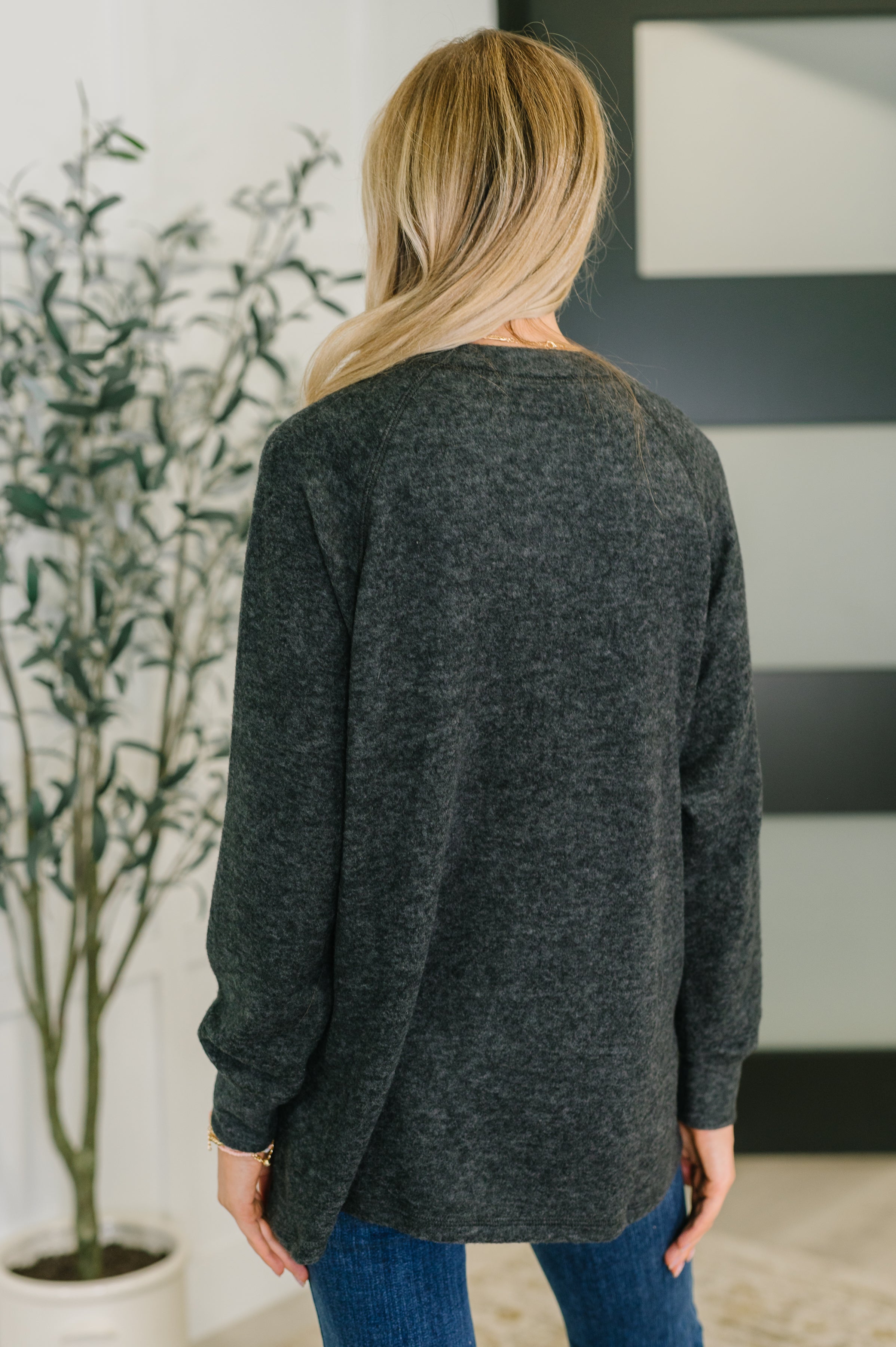 Urban Flux Scooped Hi-Low Long Pullover in Black - Charming Charlie