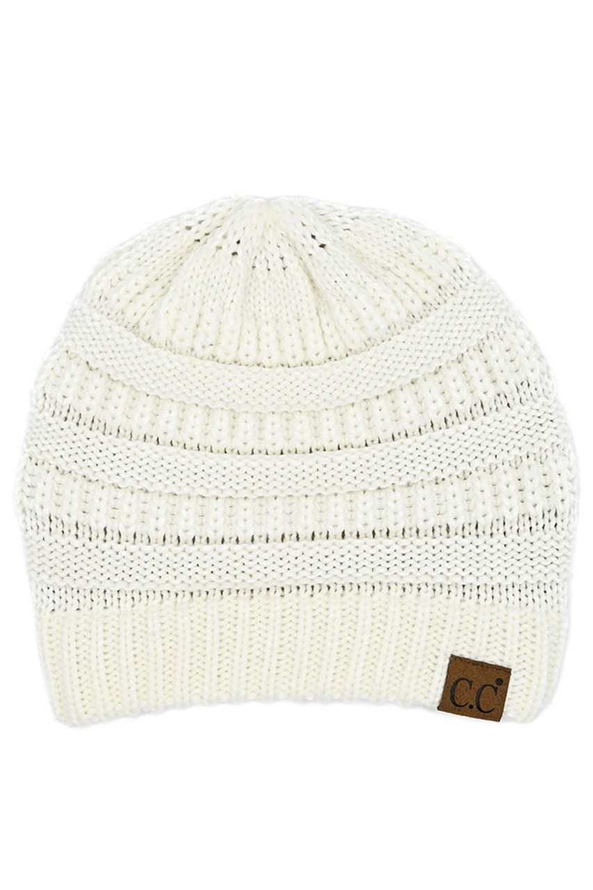 White C.C Ribbed Knit Solid Color Beanie offers a timeless design with durable ribbed knitting, ensuring a snug and comfortable fit. Crafted for warmth and versatility, this beanie is perfect for everyday wear, providing reliable protection against cold weather while maintaining a sleek, minimalist style that complements any outfit. Its solid color adds understated appeal, making it an essential accessory for both casual and outdoor use. 
