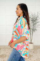 Wide Eyed Abstract Print Batwing Blouse - Charming Charlie