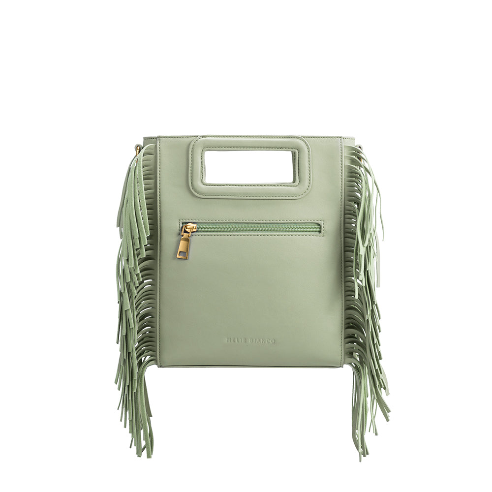 A square structured mint vegan leather crossbody bag with fringe on the side. 
