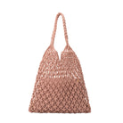 A medium blush crochet shoulder bag with a braided handle. 