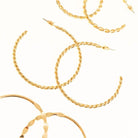 Set Of 3 Multi Texture Hoop Earrings On A Card - Charming Charlie
