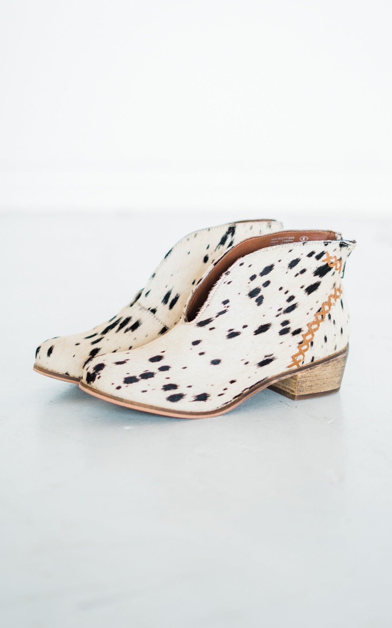 All Roads Bootie in Black and White - Charming Charlie