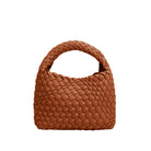 A small saddle hand woven vegan leather top handle bag.