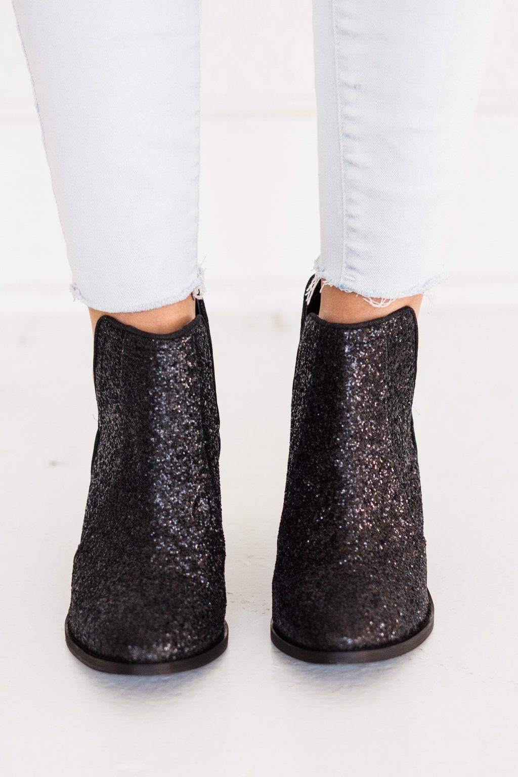Fiera Booties in Black - Charming Charlie