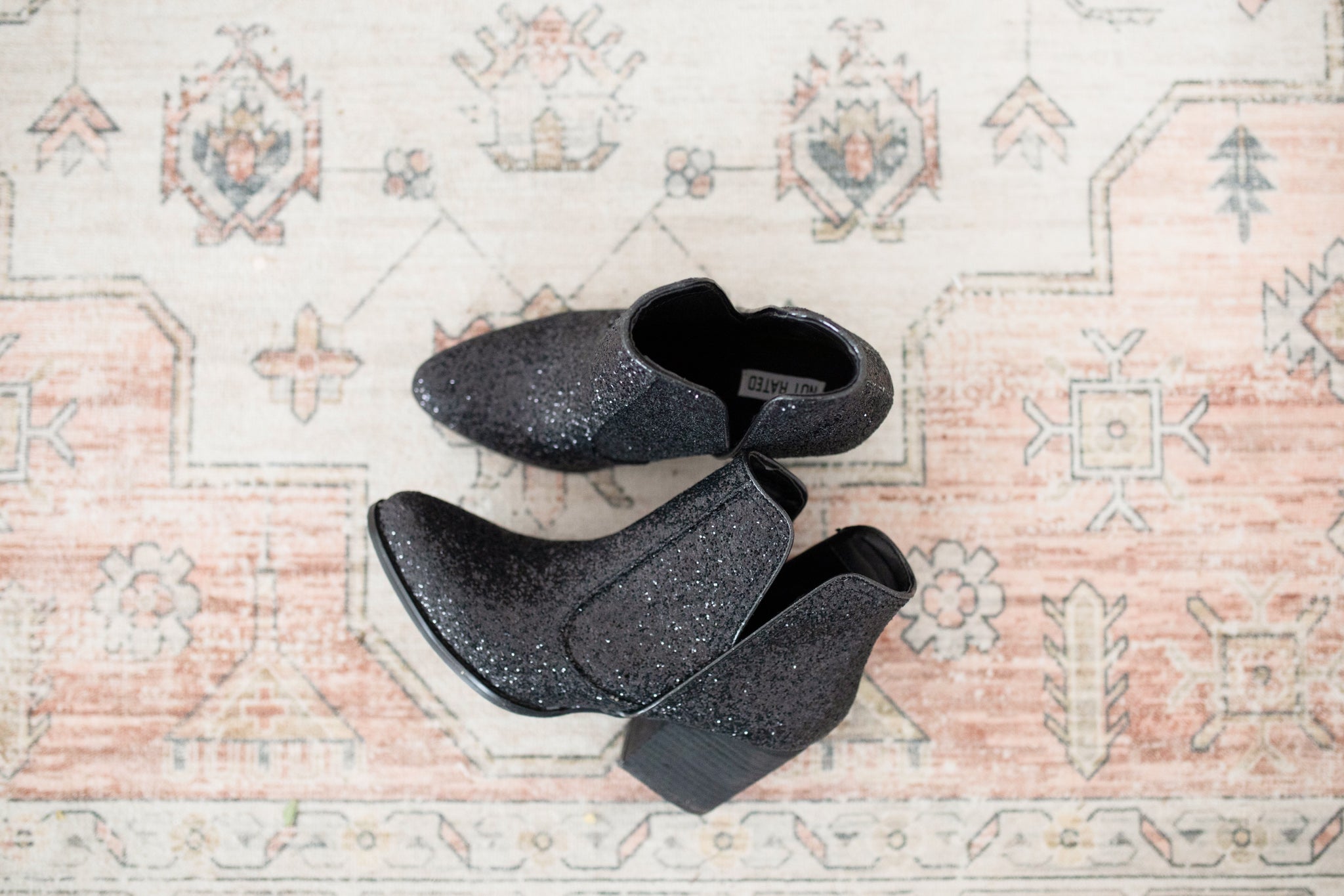 Fiera Booties in Black - Charming Charlie