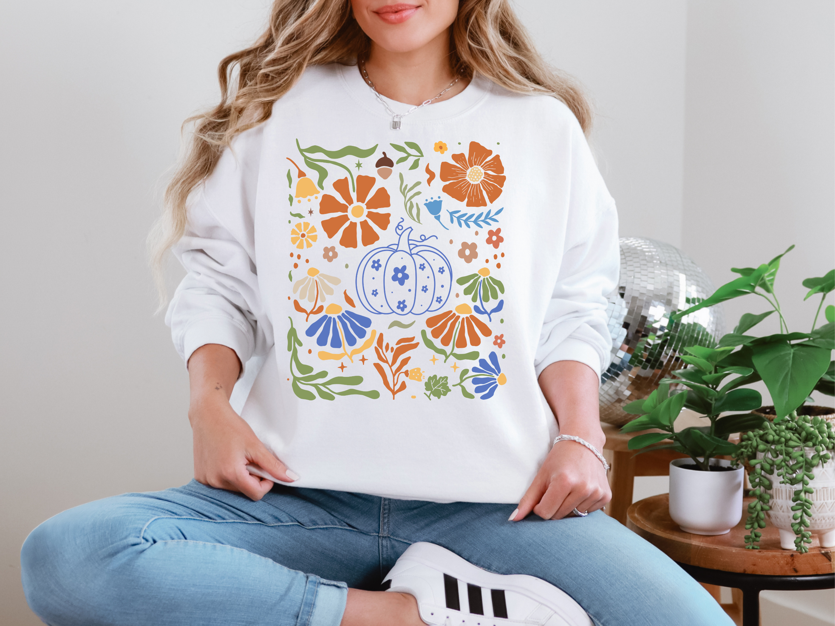 Blue Floral Pumpkin Sweatshirt in Two Colors - Charming Charlie