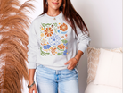 Blue Floral Pumpkin Sweatshirt in Two Colors - Charming Charlie