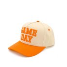 Orange C.C GAME DAY Embroidered Cotton Baseball Cap combines classic style with durable comfort. Crafted from high-quality cotton, this cap offers breathability and a soft feel, making it ideal for all-day wear. Its detailed embroidery adds a refined touch, perfect for game day or casual outings. Adjustable sizing ensures a secure fit, while the structured design maintains shape and provides sun protection. This cap is a versatile accessory that blends functionality with a polished look.