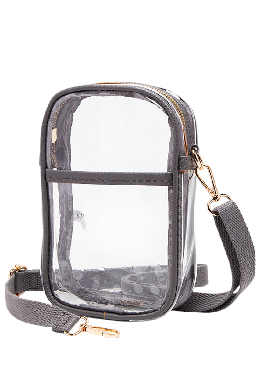 Gray Clear Crossbody Stadium Bag combines functionality with compliance, featuring a fully transparent design that meets most stadium security requirements. Its lightweight construction and adjustable crossbody strap provide comfort and ease of use, allowing quick access to your essentials while keeping them visible for hassle-free entry. Ideal for sports events, concerts, and venues with strict bag policies. 