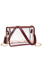 Burgundy Clear Rectangle Stadium Concert Crossbody Bag offers a sleek, transparent design ideal for event security compliance. Its rectangular shape provides ample space for essentials while maintaining a compact profile. The adjustable crossbody strap ensures comfortable wear, making it perfect for concerts and stadium visits where quick access and visibility are essential. Durable materials guarantee longevity, combining practicality with modern style for hassle-free outings. 