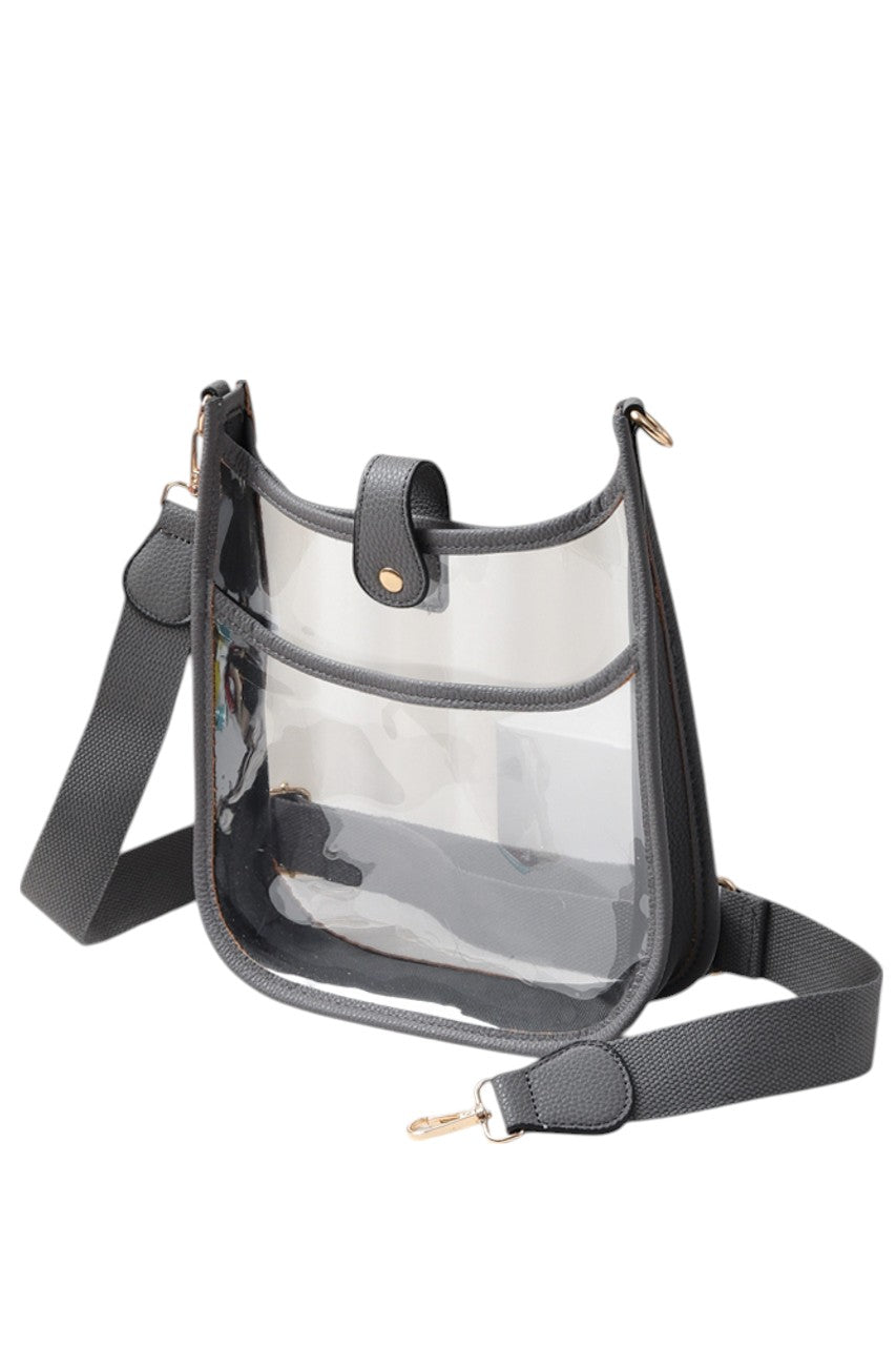 Clear Stadium Crossbody Bag offers a practical solution for carrying essentials while complying with stadium security policies. Crafted from transparent materials, it allows for quick inspection without sacrificing style. Its compact design and adjustable strap provide comfortable, hands-free convenience, making it ideal for sports events, concerts, and other venues requiring clear bags. Durable and easy to clean, this crossbody bag combines functionality with compliance for a seamless event experience. 
