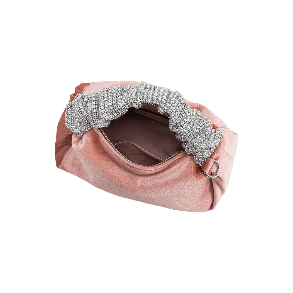 A medium velvet blush top handle bag with a silver encrusted handle. 