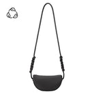 A small crescent shaped vegan leather crossbody bag with a braided strap. 