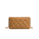 A small camel quilted vegan leather shoulder bag with gold M hardware. 