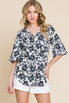 BOMBOM Floral Decorative Button V-Neck Top - Charming Charlie