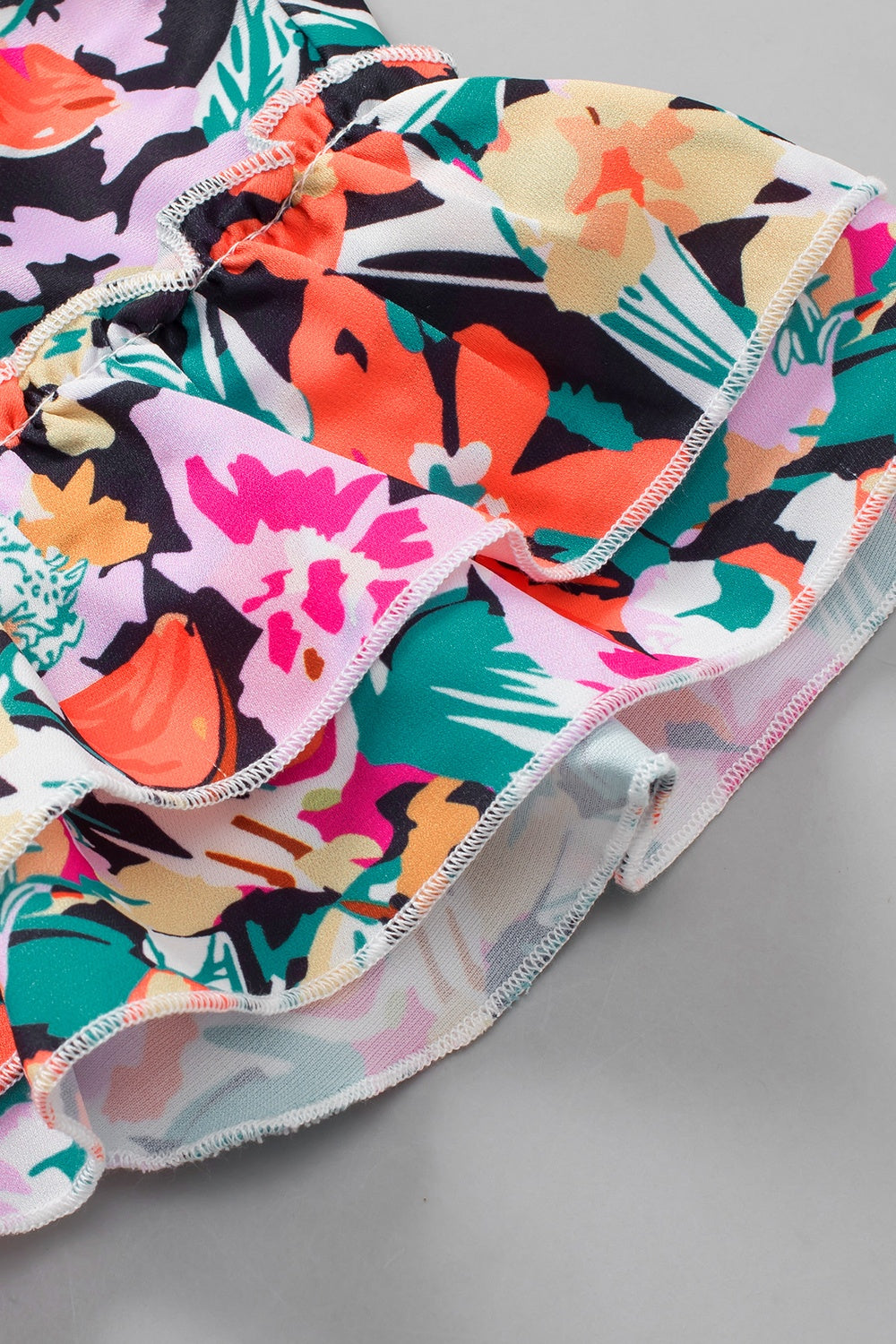 Ruffled Printed V-Neck Cap Sleeve Blouse - Charming Charlie