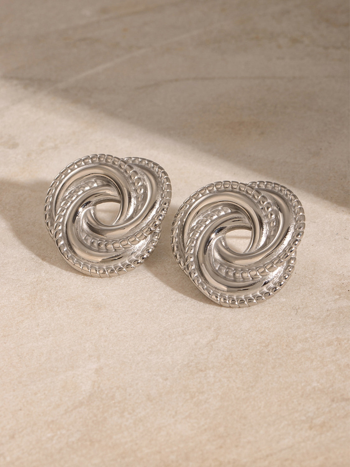 Stainless Steel Volution Stud Earrings - Charming Charlie