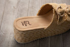 Eriwen Buckle Wedge in Cream - Charming Charlie