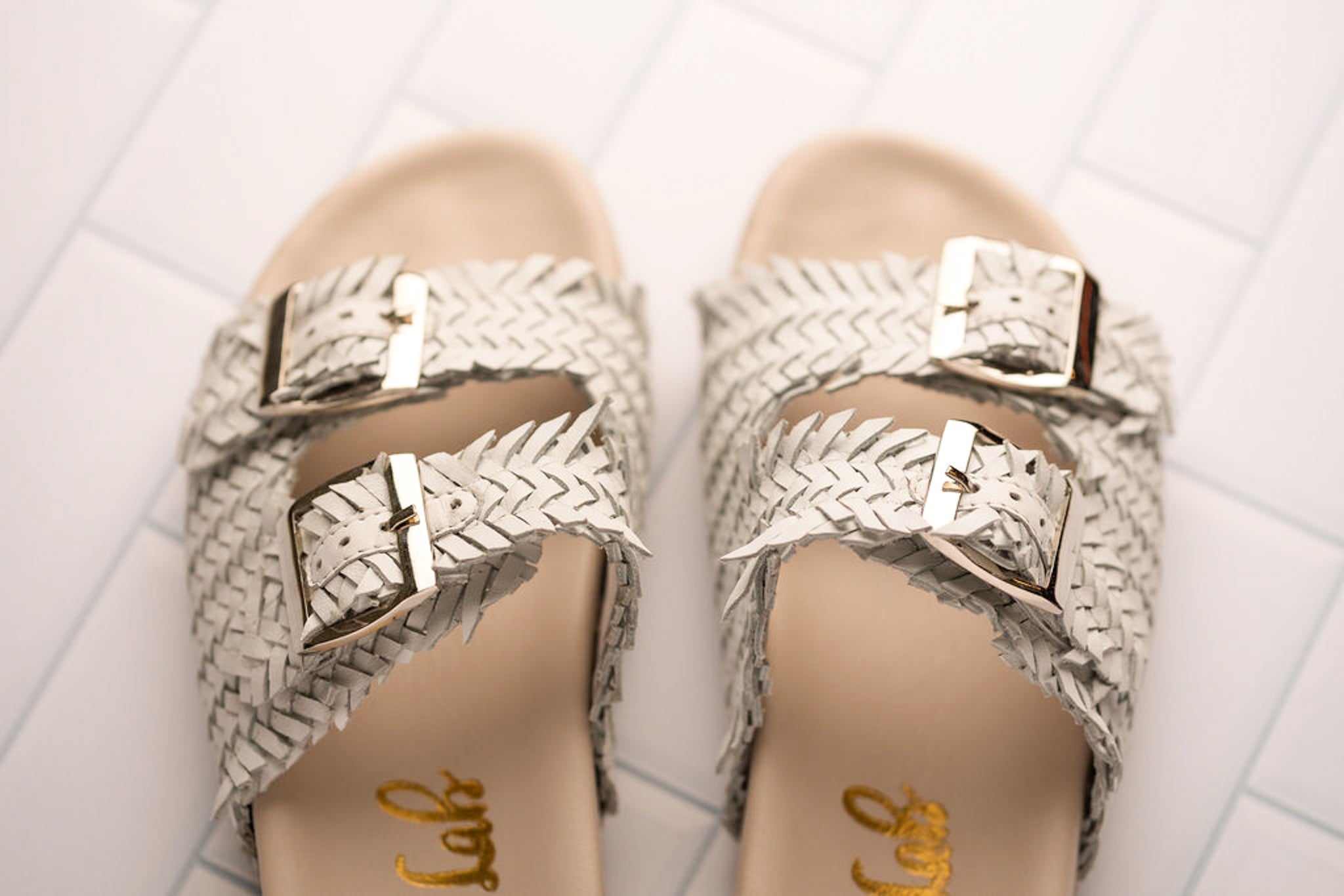 Intertwine Dual Woven Strap Slide in White - Charming Charlie