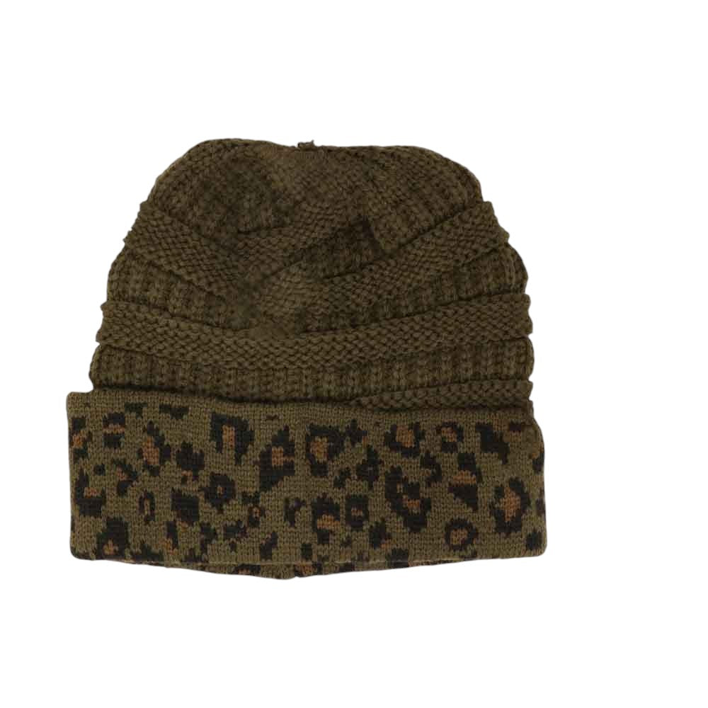 olive Matching Cuff Leopard Print CC Beanie Tail combines bold leopard patterning with a cozy cuff for an effortlessly stylish accessory. Designed with an extended tail shape, this beanie provides a comfortable fit while adding a fashionable edge to your cold-weather wardrobe. Its soft, durable fabric ensures warmth and long-lasting wear, making it a practical choice for everyday use with a distinctive flair. 