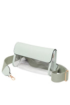 Solid Trim Clear Stadium Crossbody Bag combines transparency with reinforced solid trim for enhanced durability and style. Designed to meet stadium security requirements, it offers easy visibility of contents while maintaining a sleek, structured look. Its crossbody design ensures comfortable, hands-free wear, making it a practical choice for events where convenience and compliance are essential.