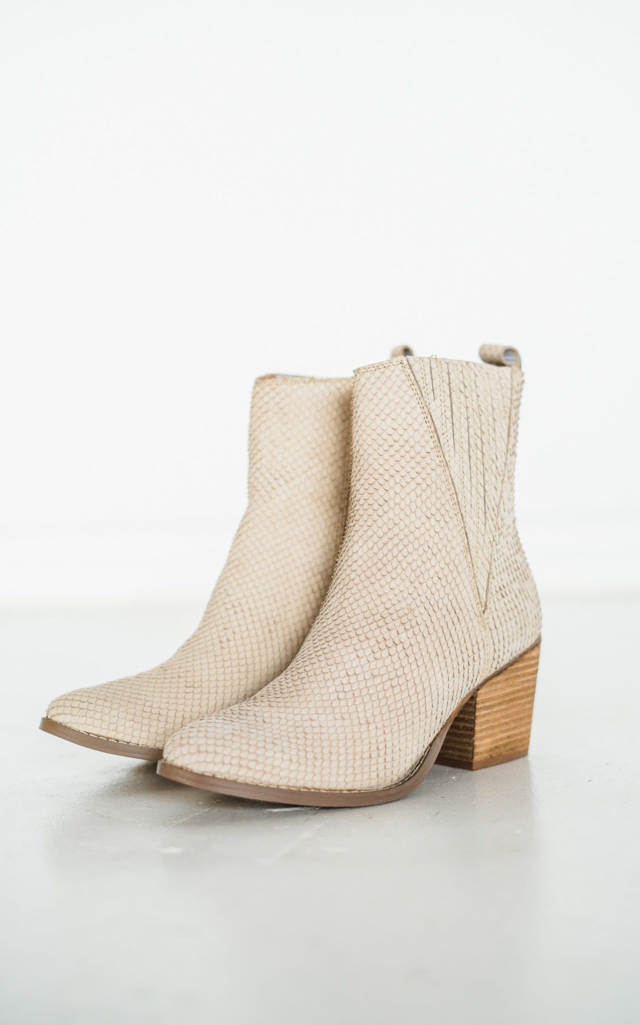Taris Ankle Boot in Cream - Charming Charlie