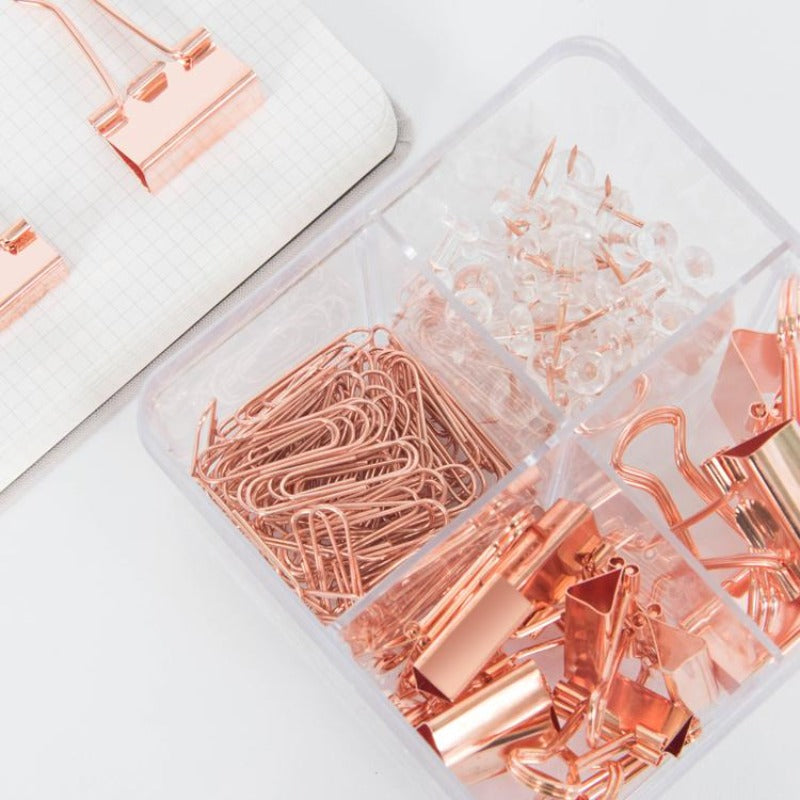 Rose gold paper clips, binder clips, and push pins