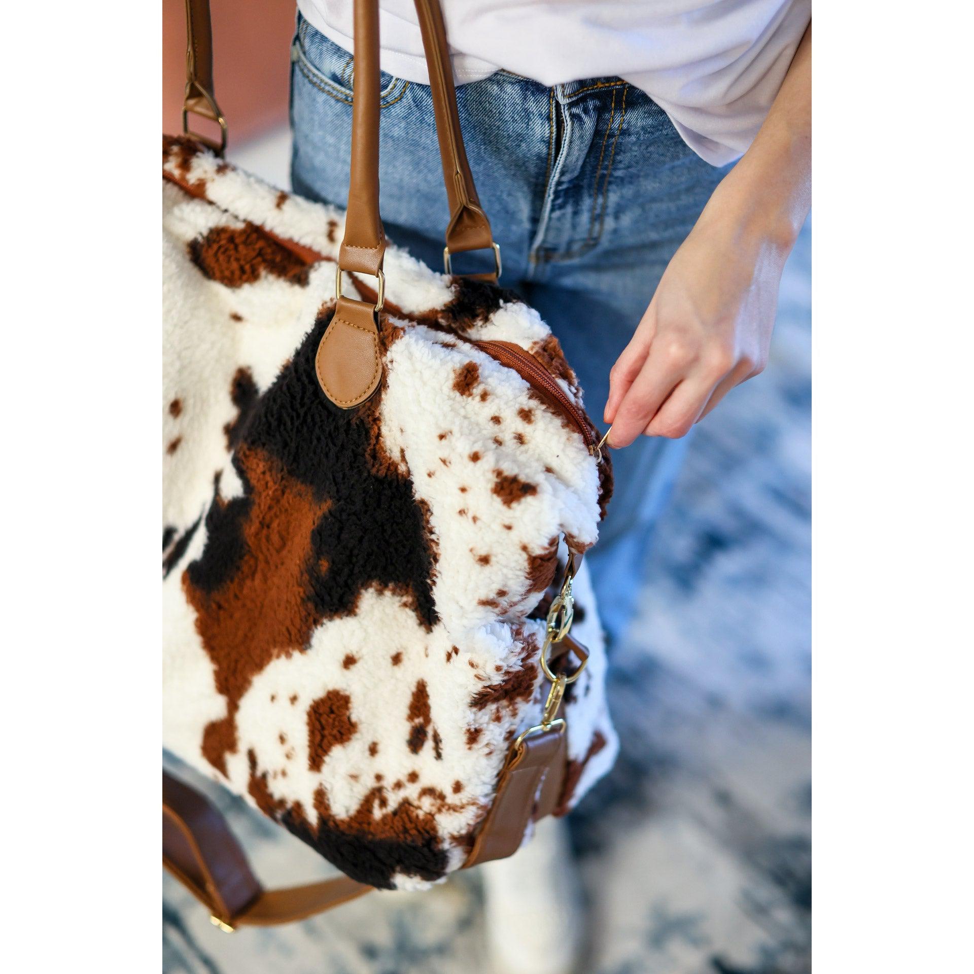 Ready to Ship Cow Print Sherpa Weekender Bag Charming Charlie