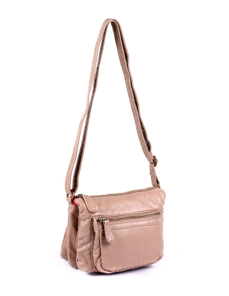 Taupe leather crossbody bag with multiple zippered pockets, adjustable strap, and a sleek design.