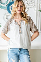 Heimish Full Size Animal Print Half Button Short Sleeve Top - Charming Charlie